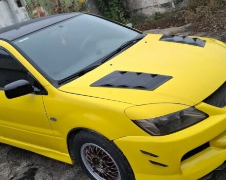 Жовтий Міцубісі Lancer, об'ємом двигуна 1.3 л та пробігом 380 тис. км за 3500 $, фото 1 на Automoto.ua