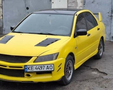 Желтый Мицубиси Лансер, объемом двигателя 1.3 л и пробегом 380 тыс. км за 3500 $, фото 8 на Automoto.ua