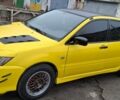 Жовтий Міцубісі Lancer, об'ємом двигуна 1.3 л та пробігом 380 тис. км за 3500 $, фото 3 на Automoto.ua