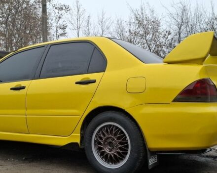 Жовтий Міцубісі Lancer, об'ємом двигуна 1.3 л та пробігом 380 тис. км за 3500 $, фото 4 на Automoto.ua