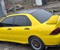 Жовтий Міцубісі Lancer, об'ємом двигуна 1.3 л та пробігом 380 тис. км за 3500 $, фото 13 на Automoto.ua
