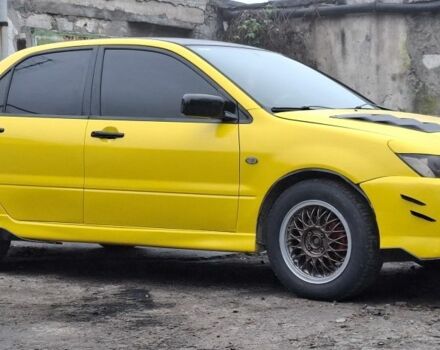 Жовтий Міцубісі Lancer, об'ємом двигуна 1.3 л та пробігом 380 тис. км за 3500 $, фото 15 на Automoto.ua