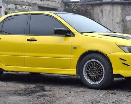 Желтый Мицубиси Лансер, объемом двигателя 1.3 л и пробегом 380 тыс. км за 3500 $, фото 14 на Automoto.ua