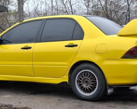 Жовтий Міцубісі Lancer, об'ємом двигуна 1.3 л та пробігом 380 тис. км за 3500 $, фото 20 на Automoto.ua