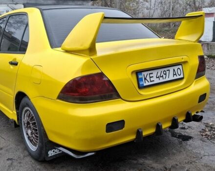 Жовтий Міцубісі Lancer, об'ємом двигуна 1.3 л та пробігом 380 тис. км за 3500 $, фото 2 на Automoto.ua