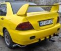 Жовтий Міцубісі Lancer, об'ємом двигуна 1.3 л та пробігом 380 тис. км за 3500 $, фото 2 на Automoto.ua