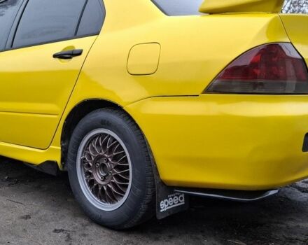 Жовтий Міцубісі Lancer, об'ємом двигуна 1.3 л та пробігом 380 тис. км за 3500 $, фото 17 на Automoto.ua