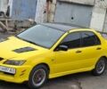 Жовтий Міцубісі Lancer, об'ємом двигуна 1.3 л та пробігом 380 тис. км за 3500 $, фото 12 на Automoto.ua