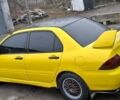 Желтый Мицубиси Лансер, объемом двигателя 1.3 л и пробегом 380 тыс. км за 3500 $, фото 12 на Automoto.ua