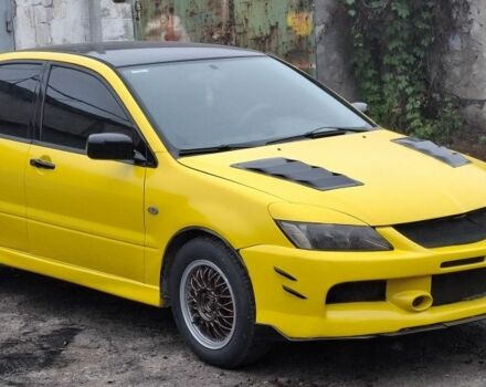 Жовтий Міцубісі Lancer, об'ємом двигуна 1.3 л та пробігом 380 тис. км за 3500 $, фото 16 на Automoto.ua