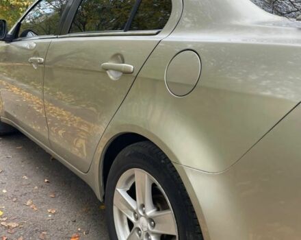 Желтый Мицубиси Лансер, объемом двигателя 1.5 л и пробегом 221 тыс. км за 5300 $, фото 5 на Automoto.ua