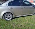 Жовтий Міцубісі Lancer, об'ємом двигуна 2 л та пробігом 175 тис. км за 6250 $, фото 11 на Automoto.ua