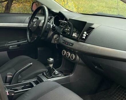 Желтый Мицубиси Лансер, объемом двигателя 1.5 л и пробегом 221 тыс. км за 5300 $, фото 6 на Automoto.ua