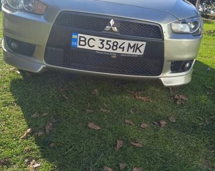 Жовтий Міцубісі Lancer, об'ємом двигуна 2 л та пробігом 175 тис. км за 6250 $, фото 13 на Automoto.ua
