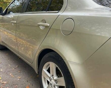 Желтый Мицубиси Лансер, объемом двигателя 1.5 л и пробегом 221 тыс. км за 5300 $, фото 4 на Automoto.ua