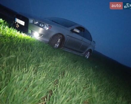 Жовтий Міцубісі Lancer, об'ємом двигуна 2 л та пробігом 175 тис. км за 6250 $, фото 8 на Automoto.ua