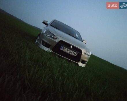 Жовтий Міцубісі Lancer, об'ємом двигуна 2 л та пробігом 175 тис. км за 6250 $, фото 6 на Automoto.ua