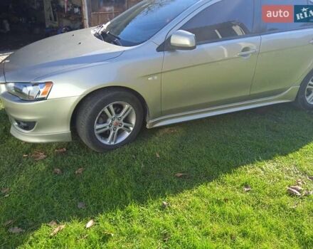 Жовтий Міцубісі Lancer, об'ємом двигуна 2 л та пробігом 175 тис. км за 6250 $, фото 12 на Automoto.ua