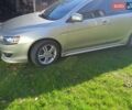 Жовтий Міцубісі Lancer, об'ємом двигуна 2 л та пробігом 175 тис. км за 6250 $, фото 12 на Automoto.ua