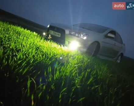 Жовтий Міцубісі Lancer, об'ємом двигуна 2 л та пробігом 175 тис. км за 6250 $, фото 10 на Automoto.ua