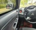 Желтый Мицубиси Лансер, объемом двигателя 1.5 л и пробегом 260 тыс. км за 6300 $, фото 6 на Automoto.ua