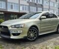 Желтый Мицубиси Лансер, объемом двигателя 1.5 л и пробегом 260 тыс. км за 6300 $, фото 1 на Automoto.ua
