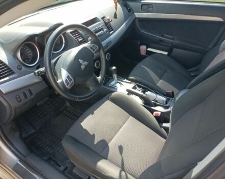 Желтый Мицубиси Лансер, объемом двигателя 2 л и пробегом 137 тыс. км за 7300 $, фото 8 на Automoto.ua