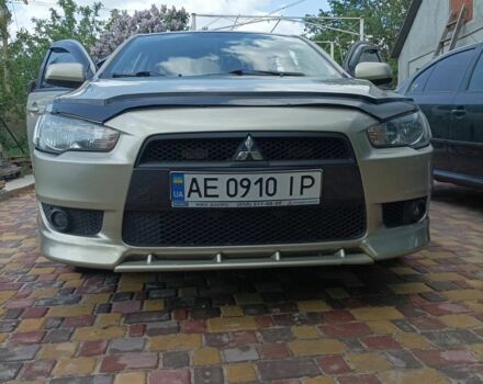 Желтый Мицубиси Лансер, объемом двигателя 2 л и пробегом 137 тыс. км за 7300 $, фото 1 на Automoto.ua