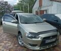 Жовтий Міцубісі Lancer, об'ємом двигуна 2 л та пробігом 136 тис. км за 8300 $, фото 1 на Automoto.ua