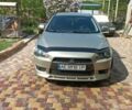 Жовтий Міцубісі Lancer, об'ємом двигуна 2 л та пробігом 136 тис. км за 8300 $, фото 4 на Automoto.ua