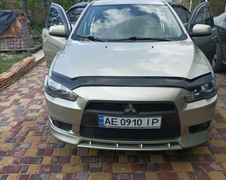 Жовтий Міцубісі Lancer, об'ємом двигуна 2 л та пробігом 136 тис. км за 8300 $, фото 5 на Automoto.ua