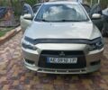 Жовтий Міцубісі Lancer, об'ємом двигуна 2 л та пробігом 136 тис. км за 8300 $, фото 5 на Automoto.ua