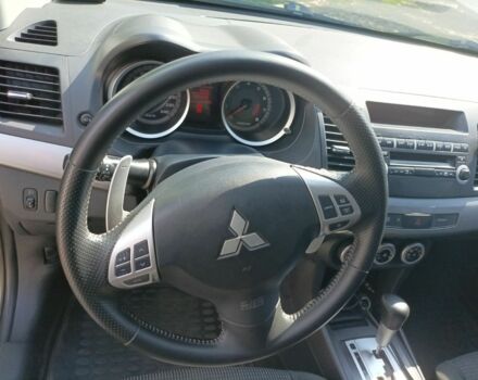 Желтый Мицубиси Лансер, объемом двигателя 2 л и пробегом 137 тыс. км за 7300 $, фото 6 на Automoto.ua