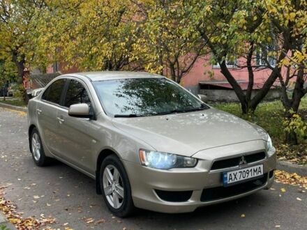 Желтый Мицубиси Лансер, объемом двигателя 1.5 л и пробегом 221 тыс. км за 5300 $, фото 1 на Automoto.ua