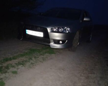 Жовтий Міцубісі Lancer, об'ємом двигуна 2 л та пробігом 175 тис. км за 6250 $, фото 1 на Automoto.ua