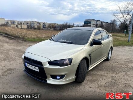 Жовтий Міцубісі Lancer, об'ємом двигуна 2 л та пробігом 218 тис. км за 7000 $, фото 1 на Automoto.ua