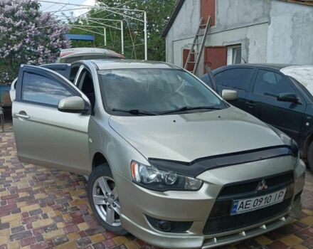 Желтый Мицубиси Лансер, объемом двигателя 2 л и пробегом 137 тыс. км за 7300 $, фото 1 на Automoto.ua