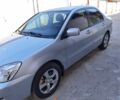 Мицубиси Лансер 2008 в Киеве на Automoto.ua Серый Мицубиси Лансер, объемом двигателя 0 л и пробегом 115 тыс. км за 7400 $, фото 1 на Automoto.ua