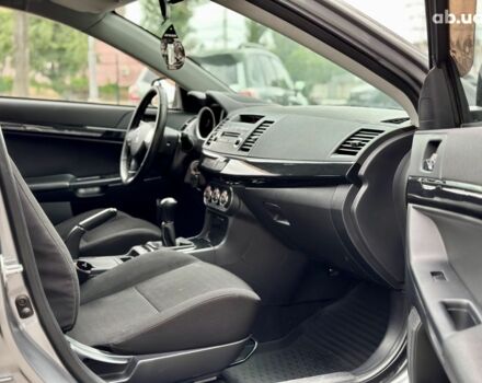 Серый Мицубиси Лансер, объемом двигателя 0 л и пробегом 154 тыс. км за 7600 $, фото 11 на Automoto.ua