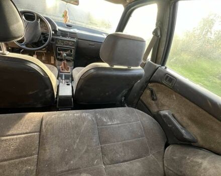 Серый Мицубиси Лансер, объемом двигателя 1.5 л и пробегом 190 тыс. км за 550 $, фото 12 на Automoto.ua