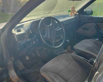 Серый Мицубиси Лансер, объемом двигателя 1.5 л и пробегом 190 тыс. км за 550 $, фото 11 на Automoto.ua