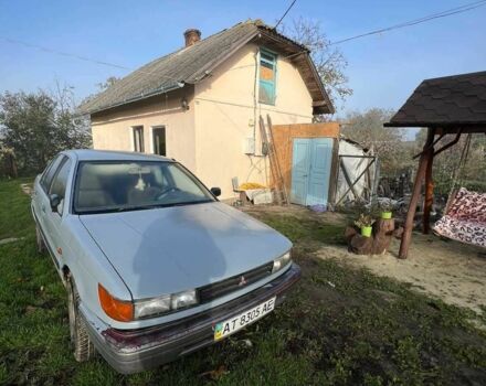 Серый Мицубиси Лансер, объемом двигателя 1.5 л и пробегом 190 тыс. км за 550 $, фото 4 на Automoto.ua