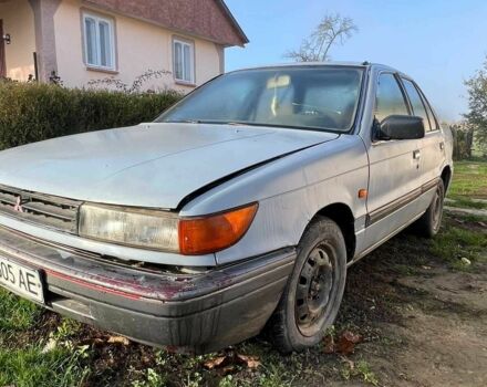 Серый Мицубиси Лансер, объемом двигателя 1.5 л и пробегом 190 тыс. км за 550 $, фото 13 на Automoto.ua