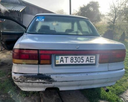 Серый Мицубиси Лансер, объемом двигателя 1.5 л и пробегом 190 тыс. км за 550 $, фото 2 на Automoto.ua