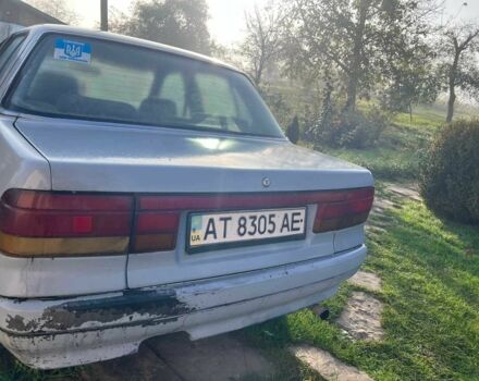 Серый Мицубиси Лансер, объемом двигателя 1.5 л и пробегом 190 тыс. км за 550 $, фото 6 на Automoto.ua