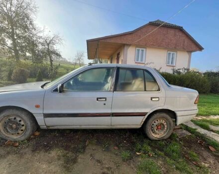 Серый Мицубиси Лансер, объемом двигателя 1.5 л и пробегом 190 тыс. км за 550 $, фото 7 на Automoto.ua