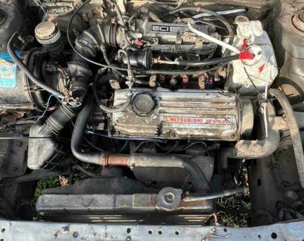 Серый Мицубиси Лансер, объемом двигателя 1.5 л и пробегом 190 тыс. км за 550 $, фото 17 на Automoto.ua