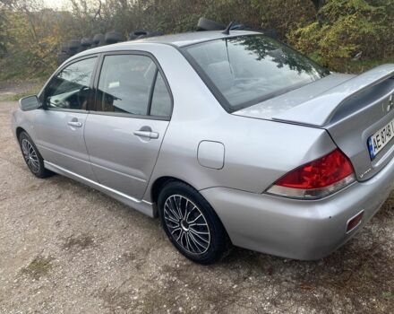 Серый Мицубиси Лансер, объемом двигателя 1.6 л и пробегом 289 тыс. км за 3150 $, фото 5 на Automoto.ua