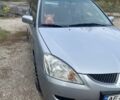 Серый Мицубиси Лансер, объемом двигателя 1.6 л и пробегом 289 тыс. км за 3150 $, фото 1 на Automoto.ua