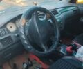 Серый Мицубиси Лансер, объемом двигателя 1 л и пробегом 3 тыс. км за 1501 $, фото 3 на Automoto.ua